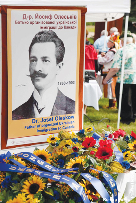 Display tableau of Dr. Josef Olesków and wreaths before Olesków Monument ceremony