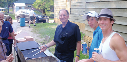 Golf Committee Chair and Master BBQ Chef Eugene Masney (centre)