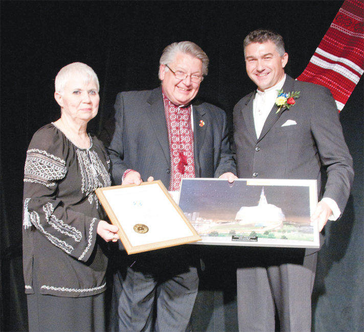 L. to R.: Sylvia Todaschuk and Taras Sokolyk of UPBCW and James Bezan, MP