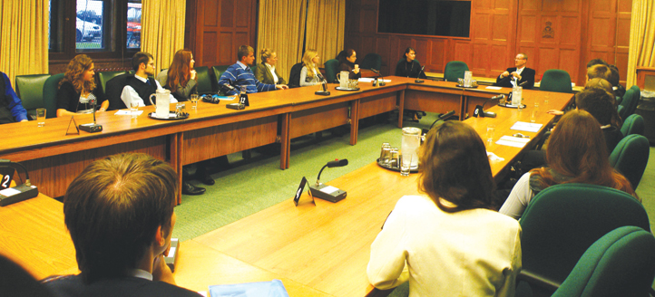 MP Borys Wrzesnewskyj (far end of table) speaks to 2010 CUPP student interns on Parliament Hill